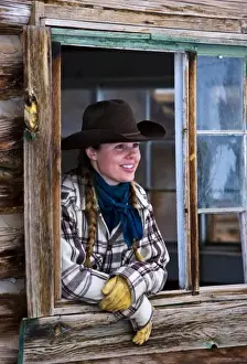 Western Scenic Prints: Cowgirl hanging out around the bunk house on The Hideout Ranch in Shell Wyoming