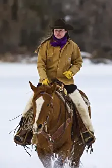 Western Scenic Prints: Cowgirl riding a horse on the range on The Hideout Ranch in Shell Wyoming