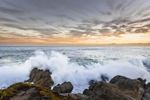 Crashing winter waves on the rocks of Lovers Point in Pacific Grove
