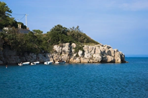 Cres, Coatia - A rocky coastline at the edge of the sea