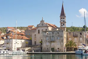Dalmatia Prints: Croatia, Brac, Milna. Church of our Lady of the Annunciation 18th century dominates