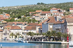 Dalmatia Prints: Croatia, Brac, Milna. Waterfront cafe