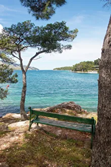 Places Collection: Croatia, Hvar Island, Stari Grad. Picturesque waterfront spot for bench
