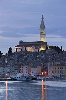 Images Dated 30th May 2007: CROATIA, Istria, ROVINJ. ROVINJ harbor view with Cathedral of St. Euphemia / Evening