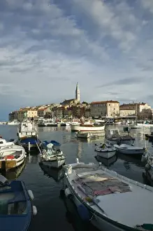 Images Dated 30th May 2007: CROATIA, Istria, ROVINJ. ROVINJ harbor view with Cathedral of St. Euphemia / Morning