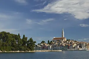 Images Dated 30th May 2007: CROATIA, Istria, ROVINJ. ROVINJ harbor view with Cathedral of St. Euphemia / Morning