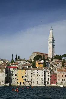 CROATIA, Istria, ROVINJ. ROVINJ waterfront view with Cathedral of St. Euphemia / Morning