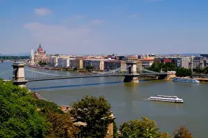 Images Dated 2050: Cruise river boat taken from hill overlooking Chain Bridge Danube River and Parliament