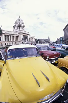 Images Dated 5th October 2004: Cuba, Havana. Classic 1950s auto at Havana Capitolio