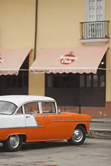 Images Dated 4th March 2012: Cuba, Havana, Havana Vieja, morning view of Old Havana street with 1950s-era US car