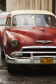 Images Dated 4th March 2012: Cuba, Havana, Havana Vieja, morning view of Old Havana street with 1950s-era US car