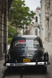 Images Dated 4th March 2012: Cuba, Havana, Havana Vieja, morning view of Old Havana street with 1950s-era US car