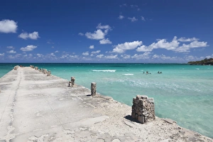 Communist Prints: Cuba, Havana Province, Playas del Este, Playa Jibacoa beach, pier