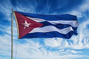 Cuba, Havana Vieja, Cuban flag waving in the breeze