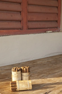 Tobacco Prints: Cuba. Vinales. Handmade cigars are for sale at a home