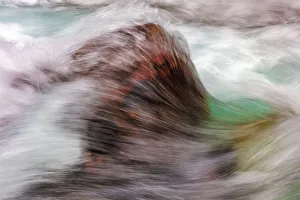 Images Dated 11th July 2018: Current splashes over red rock in Avalanche Creek in Glacier National Park, Montana, USA