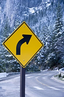 Images Dated 28th March 2007: A curve ahead road sign warns visitors entering Yosemite valley on California State