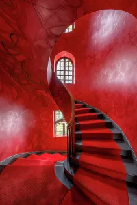 Images Dated 16th July 2024: Curved stairway with window and carpet. (AI Generated)