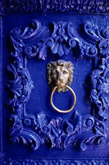 Cusco, Peru. Ornate blue painted door with lion knocker; Hotel Garcilaso
