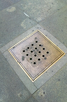 Cover Prints: Decorated sewer cover in Prague Castle, Czech Republic