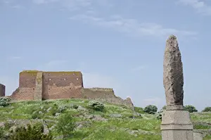 Baltic Prints: Denmark, Island of Bornholm. Stone monument in front of ruins of Hammershus Castle