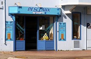 Images Dated 26th June 2006: Desclaux Anchois anchovies factory and shop, house painted with advertising in blue and white