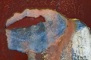 Details of rust and paint on metal