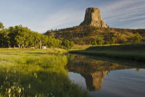 Images Dated 13th June 2009: Devils Tower National Monument, Wyoming, reflected in Belle Fourche River at sunrise