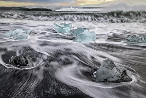 Images Dated 28th June 2024: Diamond Beach surf, Iceland