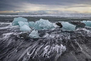 Images Dated 28th June 2024: Diamond Beach surf, Iceland