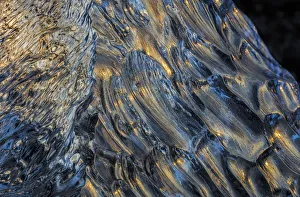 Diamond ice chards from calving icebergs on black sand beach at Jokulsarlon in south