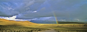 South American Prints: Dirt Road with rainbow, Altiplano, Chile, near Salar de Surire... America, South America