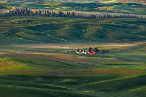 Distant idyllic farm homestead from elevated view from Steptoe Butte State Park