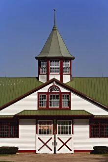 Images Dated 16th April 2005: Distinctive red, white, and green colors of horse barn, Calumet Farm, Lexington, Kentucky
