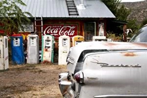 Cars Gallery: Dixon, New Mexico, United States. Vintage car and gasoline pumps