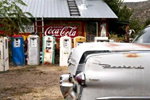 Cars Collection: Dixon, New Mexico, United States. Vintage car and gasoline pumps
