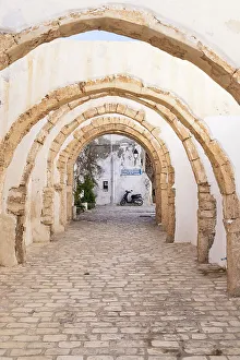 Tunisia Prints: Djerba, Medenine, Tunisia. Arched passageway in the Houmt Souk