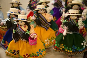 Dolls on display at market, Cuenca, Ecuador, South America