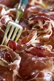 Boar Prints: Domaine de Nidoleres. Roussillon. A plate of dry cured ham with a serving fork. France