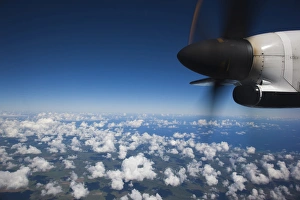 Dominican Republic, East Coast, propeller-driven airliner over coastline