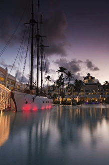 Images Dated 25th December 2009: Dominican Republic, Punta Cana Region, Bavaro, Iberostar Grand Hotel, Pool View, evening
