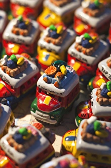 Images Dated 26th December 2009: Dominican Republic, Punta Cana Region, Bavaro, toy busses on Dominican map