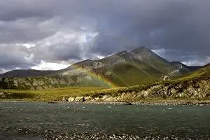 Images Dated 20th June 2006: A double rainbow arches over the Kongakut river landcapse - Arctic National Wildlife