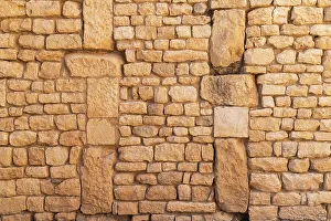 Roman Prints: Dougga, Beja, Tunisia. Stone wall in a building at the Roman ruins