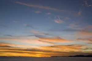 Dramatic clouds over lake at sunset, viewed from Suasi Island (also known as Isla Suasi)