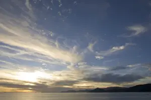 Suasi Prints: Dramatic clouds over lake, viewed from Suasi Island (also known as Isla Suasi)