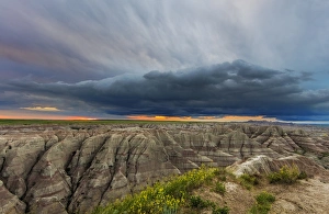 Great Plain Prints: Dramatic storm cloud at sunrise in Badlands National Park, South Dakota, USA