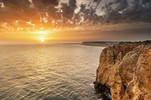 Images Dated 2023: Dramatic sunset clouds over Cliffs along the coast at Ponta da Piedade in Lagos, Portugal