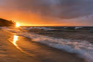 Dramatic sunset light light along Miners Beach in Pictured Rocks National Lakeshore