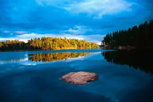 Images Dated 21st February 2006: Early Evening reflections in the boundry waters of Minnesota-Ontario